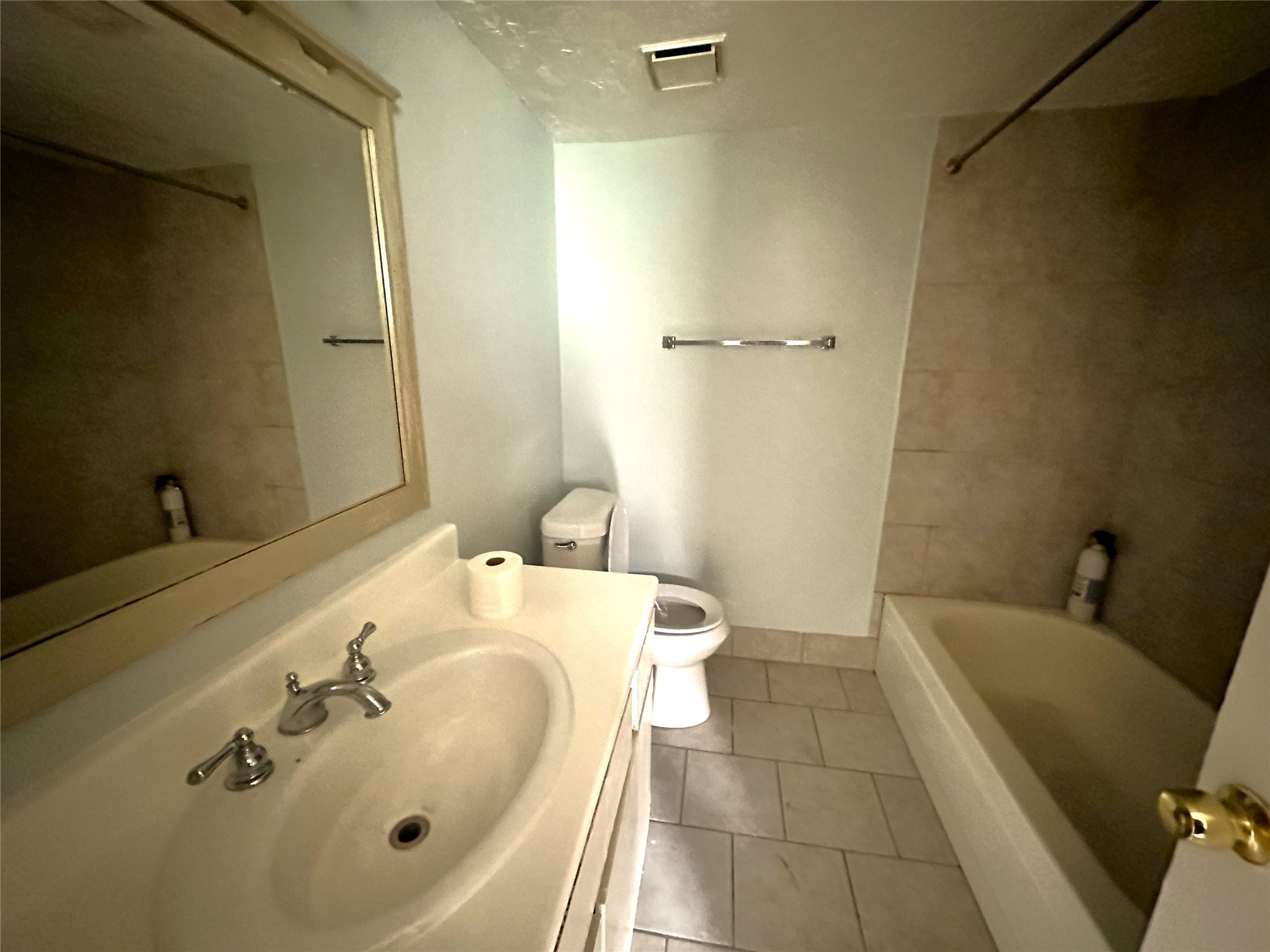 607 Reed Avenue Wharton, TX 77488 - Photo 7 of 13 a bathroom with a sink and a tub