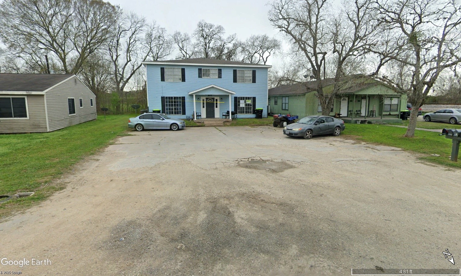 607 Reed Avenue Wharton, TX 77488 - Photo 10 of 13 a front view of a house with a yard and garage