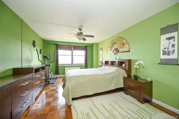 a bed room with a bed and a window