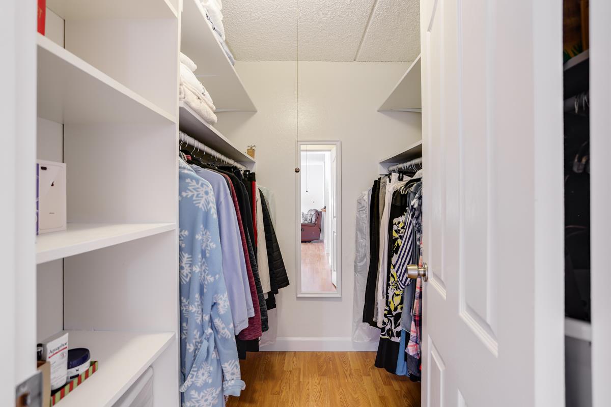 1700 Civic Center Drive, Unit 214 Santa Clara, CA 95050 - Photo 11 of 17 a view of walk in closet with clothes and shoes
