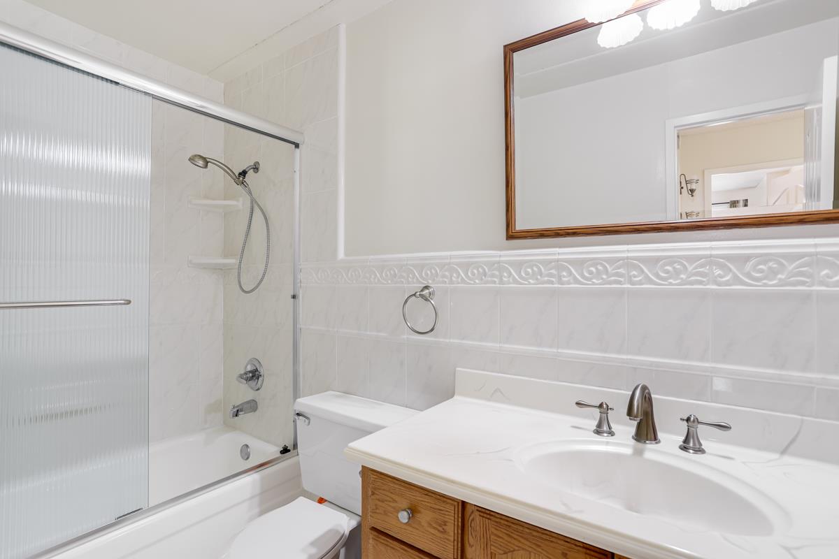 1700 Civic Center Drive, Unit 214 Santa Clara, CA 95050 - Photo 12 of 17 a bathroom with a sink toilet and shower