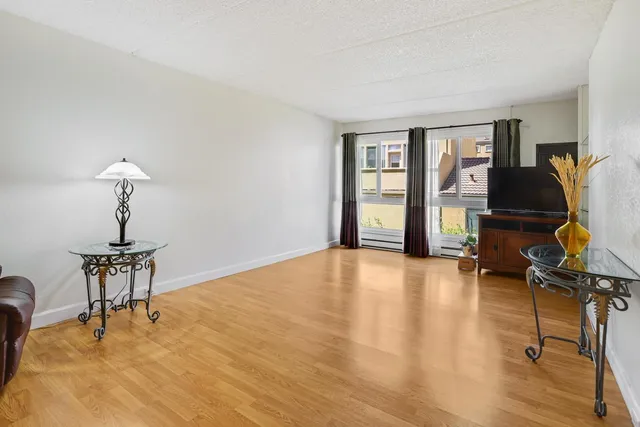 a view of livingroom with furniture and wooden floor
