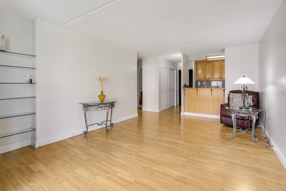 1700 Civic Center Drive, Unit 214 Santa Clara, CA 95050 - Photo 5 of 17 a view of livingroom with furniture and wooden floor