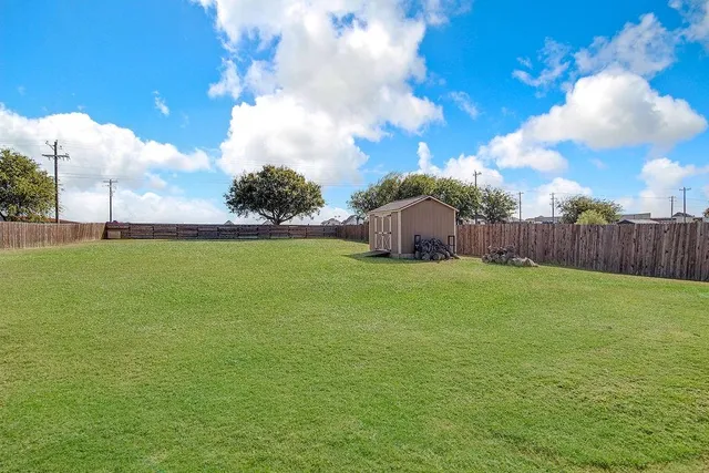 a view of a golf course with a garden