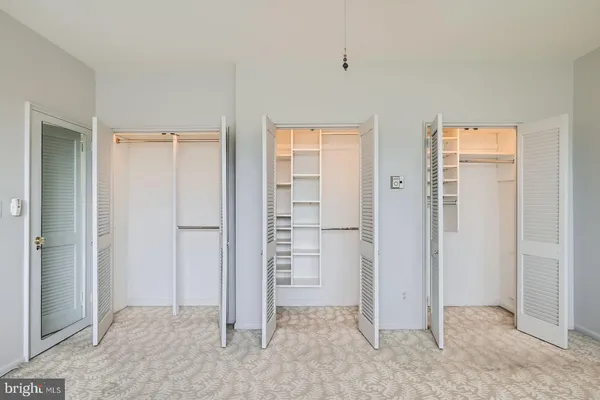 an empty room with closet