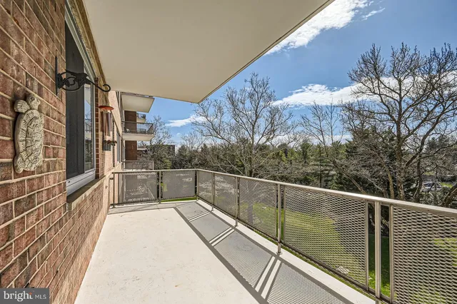 a view of balcony with furniture