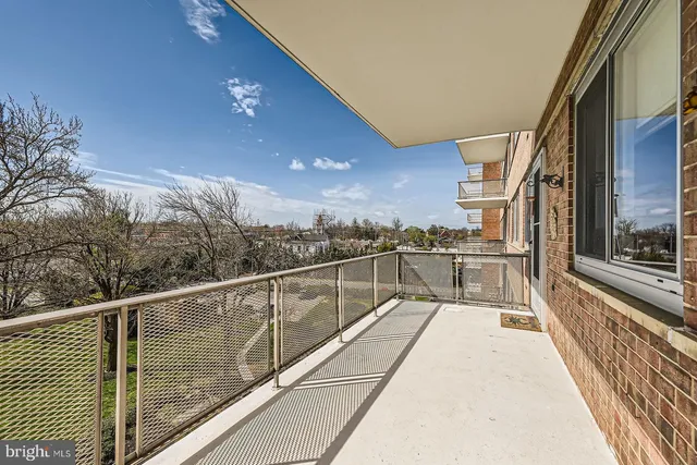 a view of balcony with couches