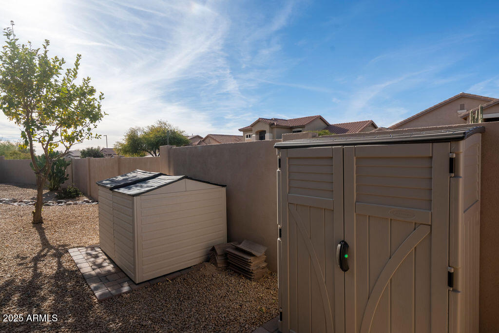 4415 East Weaver Road Phoenix, AZ 85050 - Photo 19 of 23 SIDE AREA WITH SHEDS
