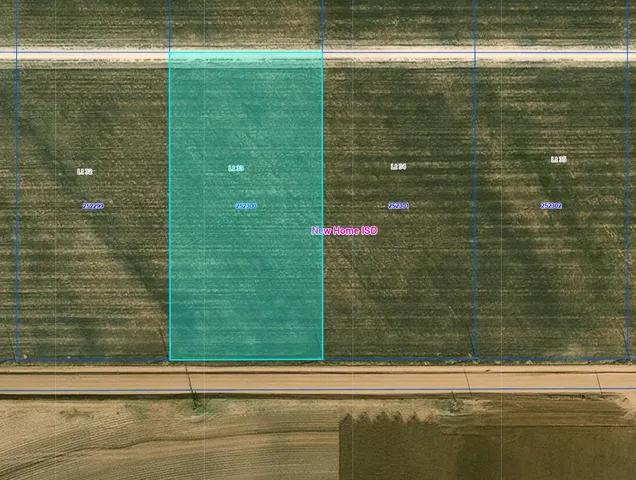 a front view of a building with a yard