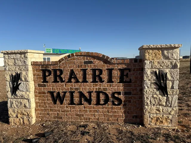 a view of a lake with a sign board