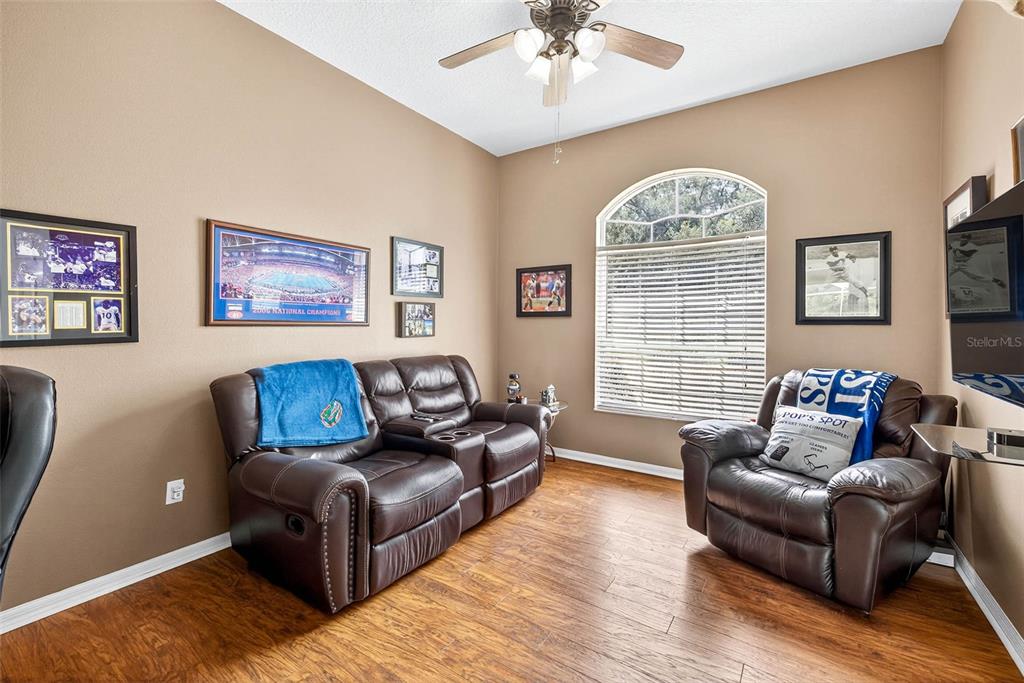 8518 West Knights Griffin Road Plant City, FL 33565 - Photo 43 of 74 a living room with furniture and a window