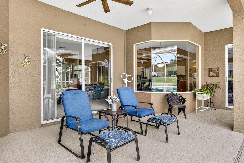 8518 West Knights Griffin Road Plant City, FL 33565 - Photo 49 of 74 a dining room with furniture and window