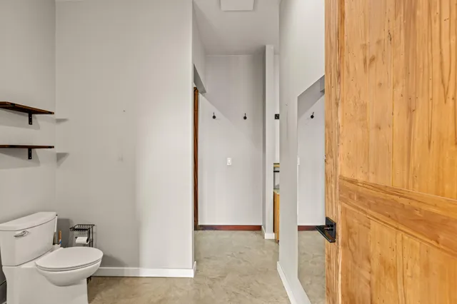 a bathroom with a bathtub and shower
