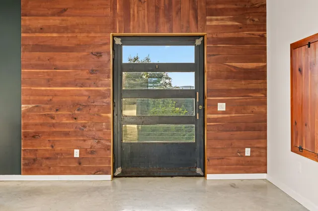 a view of a park with large trees