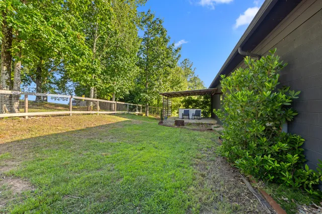 a view of lake with green space