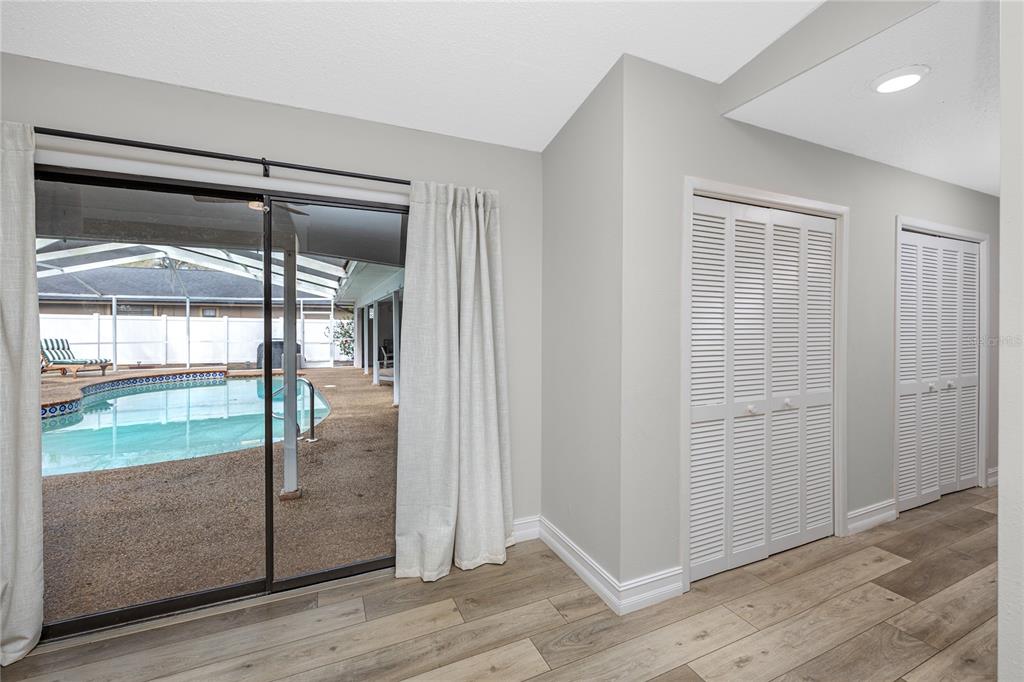 27 Summit Lane Safety Harbor, FL 34695 - Photo 16 of 48 an empty room and sliding glass door shower