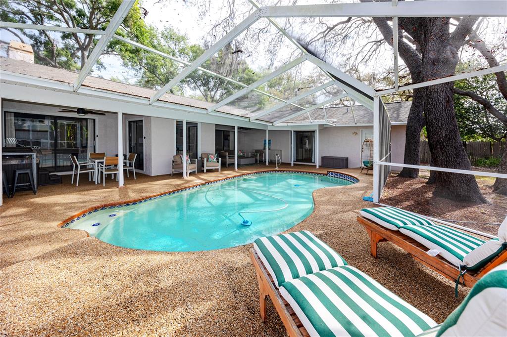 27 Summit Lane Safety Harbor, FL 34695 - Photo 2 of 48 an outdoor view of the patio and dining space