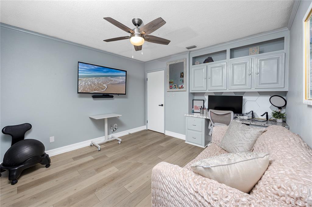 27 Summit Lane Safety Harbor, FL 34695 - Photo 23 of 48 a living room with furniture and a fireplace