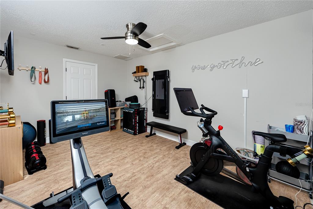 27 Summit Lane Safety Harbor, FL 34695 - Photo 36 of 48 a view of a room with gym equipment