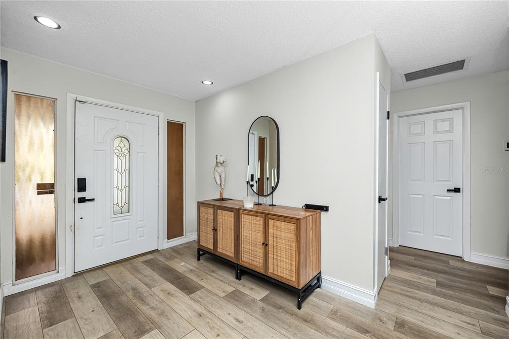 27 Summit Lane Safety Harbor, FL 34695 - Photo 4 of 48 a view of a room with front door