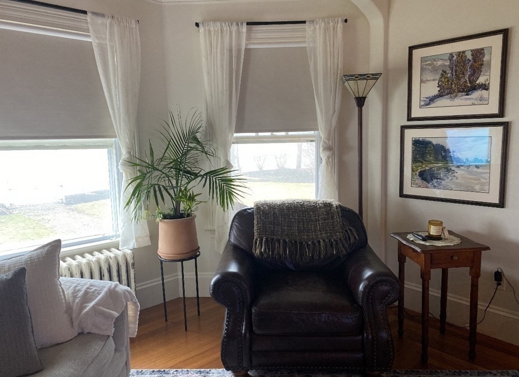 802 State Road Plymouth, MA 02360 - Photo 16 of 42 a living room with furniture and a large window