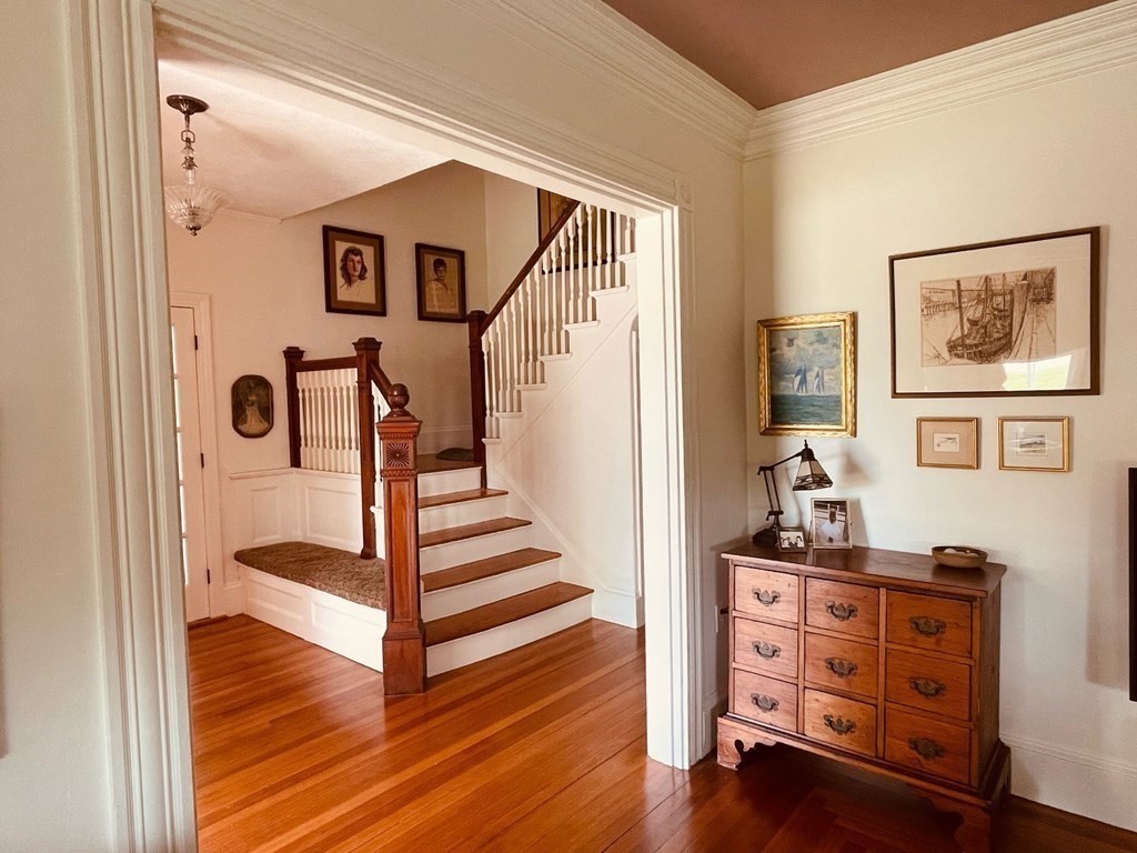 802 State Road Plymouth, MA 02360 - Photo 19 of 42 a view of a hallway with wooden floor and cabinet