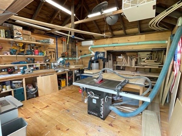 802 State Road Plymouth, MA 02360 - Photo 41 of 42 a room with lots of wooden furniture