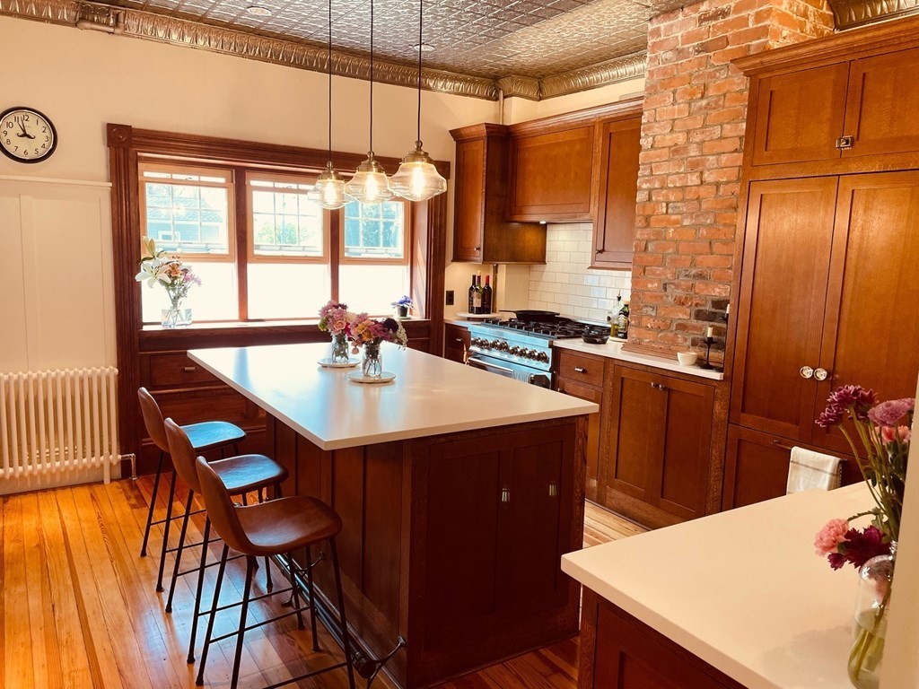 802 State Road Plymouth, MA 02360 - Photo 6 of 42 a dining room with a table and chairs