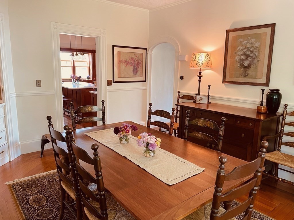 802 State Road Plymouth, MA 02360 - Photo 9 of 42 a view of a dining room with furniture and wooden floor