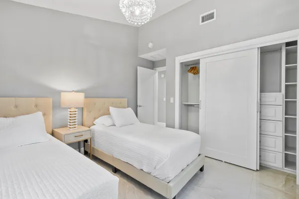 a living room with furniture and a toilet