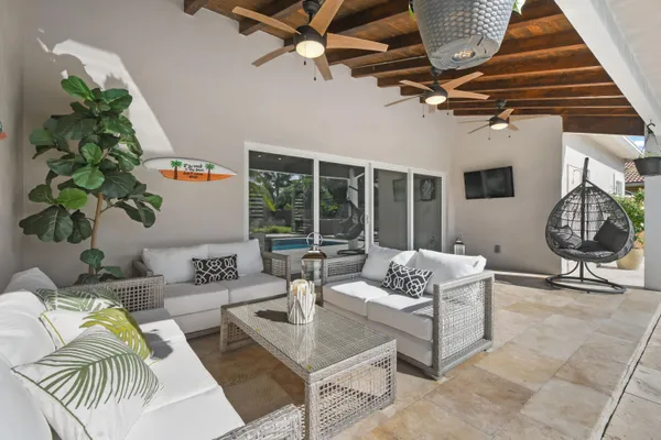 a view of a porch with furniture