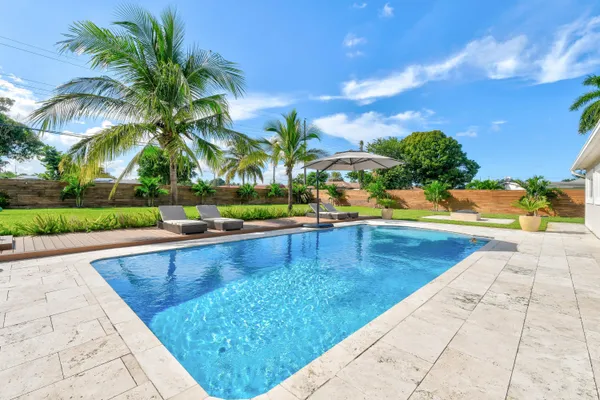 swimming pool view with seating space