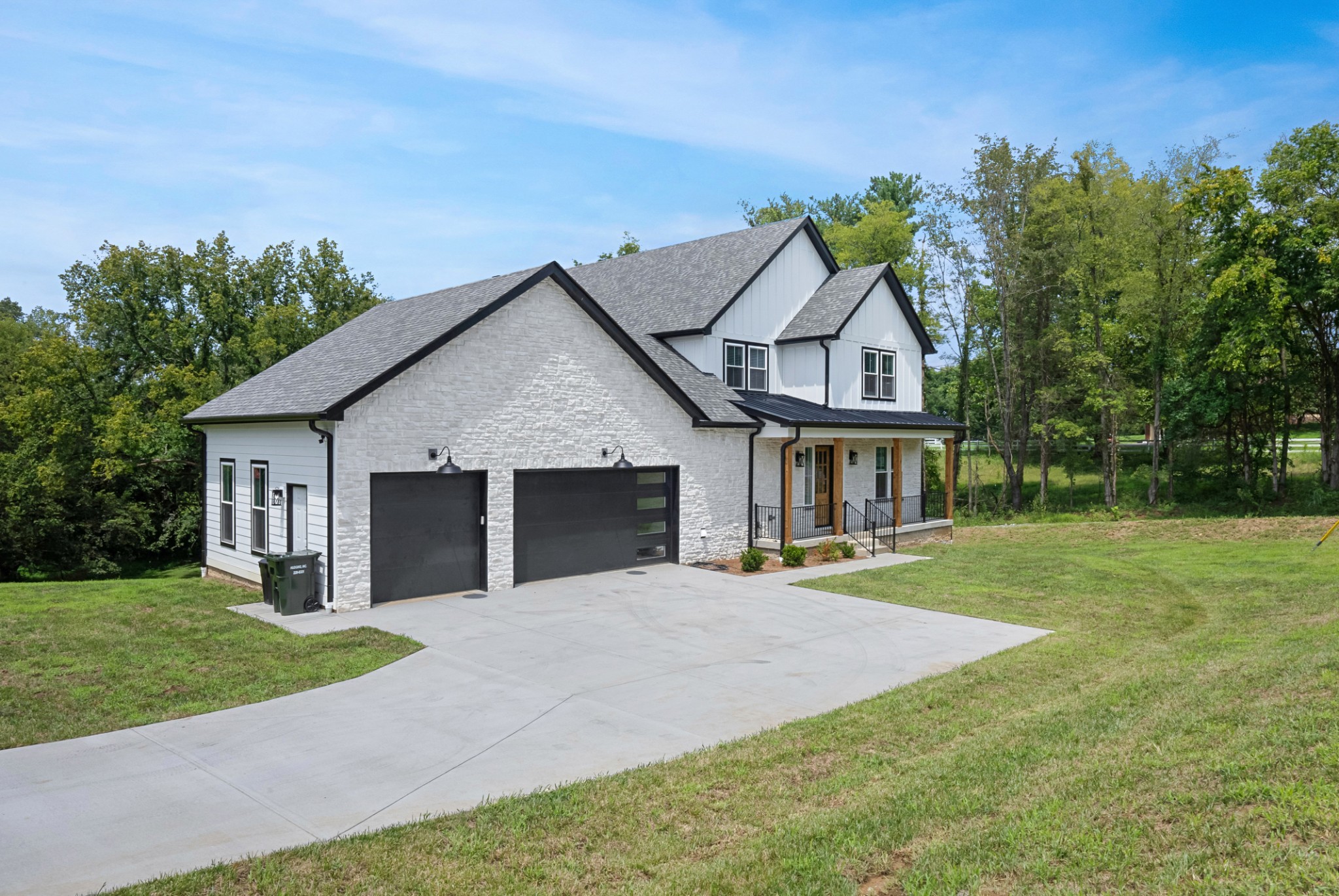 337 Vanderbilt Road Mount Juliet, TN 37122 - Photo 2 of 50 a view of a house with a yard and potted plants
