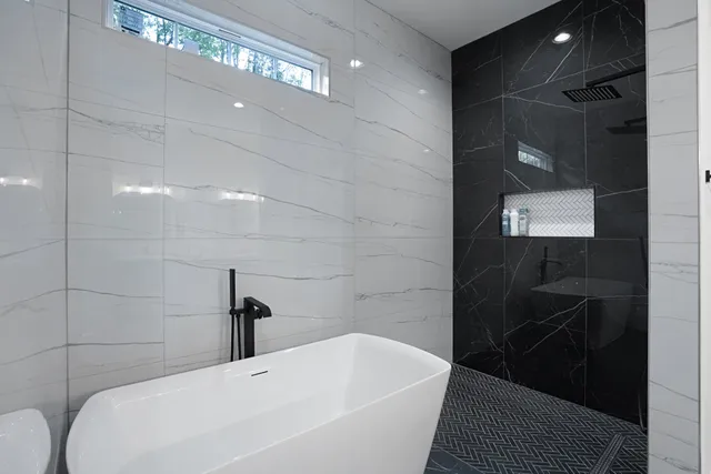 a bathroom with a double vanity sink and mirror