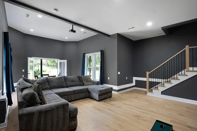 a workspace with furniture and a window