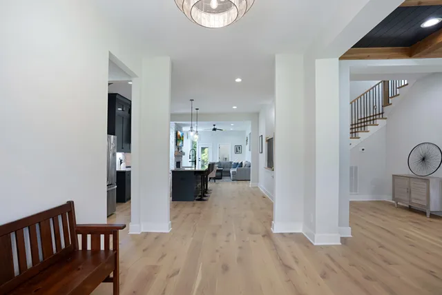 a view of a living room and dining room