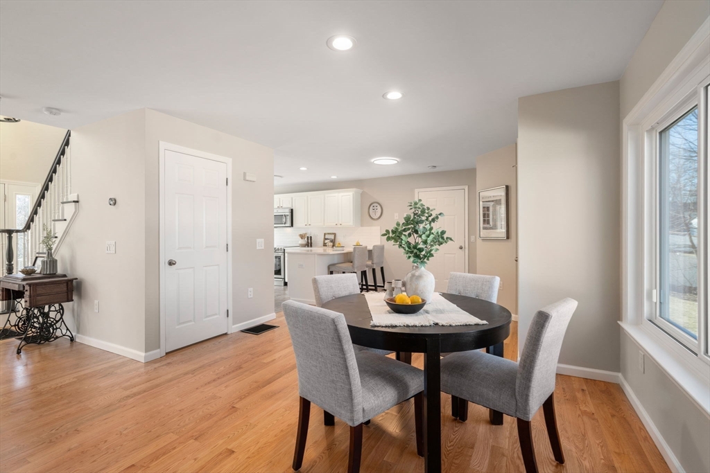 12 Silvermine Road Woburn, MA 01801 - Photo 13 of 36 a view of a dining room with furniture and wooden floor