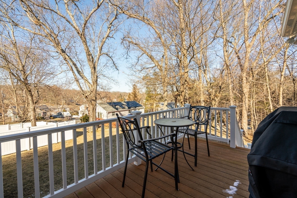 12 Silvermine Road Woburn, MA 01801 - Photo 18 of 36 a view of a chairs on the roof deck