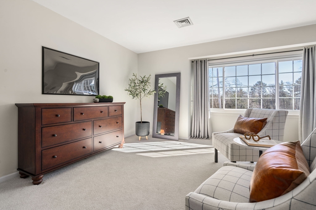 12 Silvermine Road Woburn, MA 01801 - Photo 21 of 36 a living room with furniture and a window