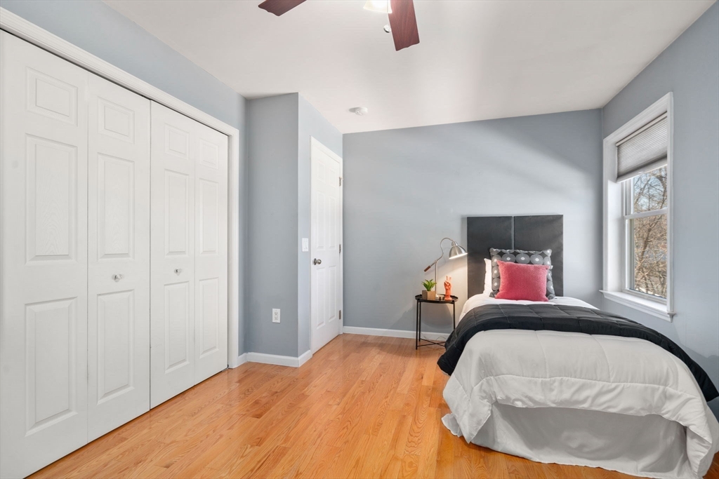 12 Silvermine Road Woburn, MA 01801 - Photo 30 of 36 a bedroom with a bed and a window