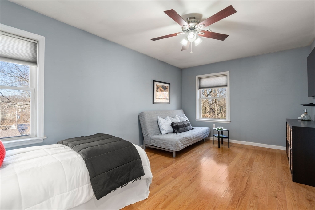 12 Silvermine Road Woburn, MA 01801 - Photo 31 of 36 a bedroom with a bed and a couch