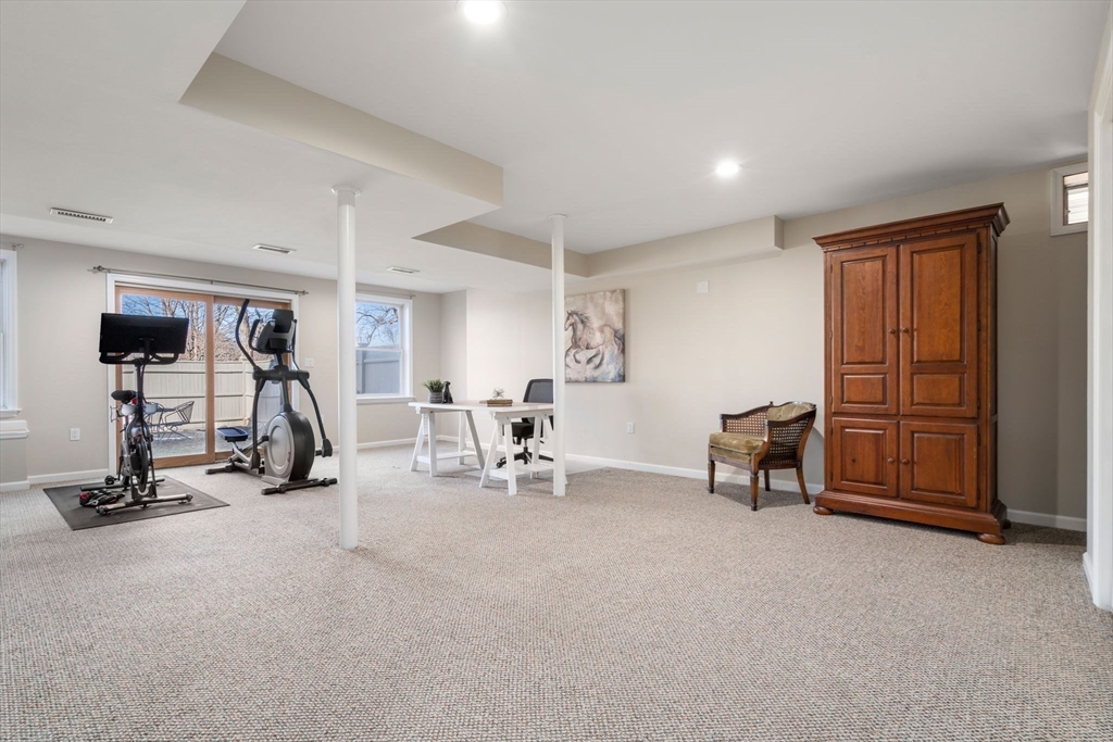 12 Silvermine Road Woburn, MA 01801 - Photo 33 of 36 a view of a room with gym equipment