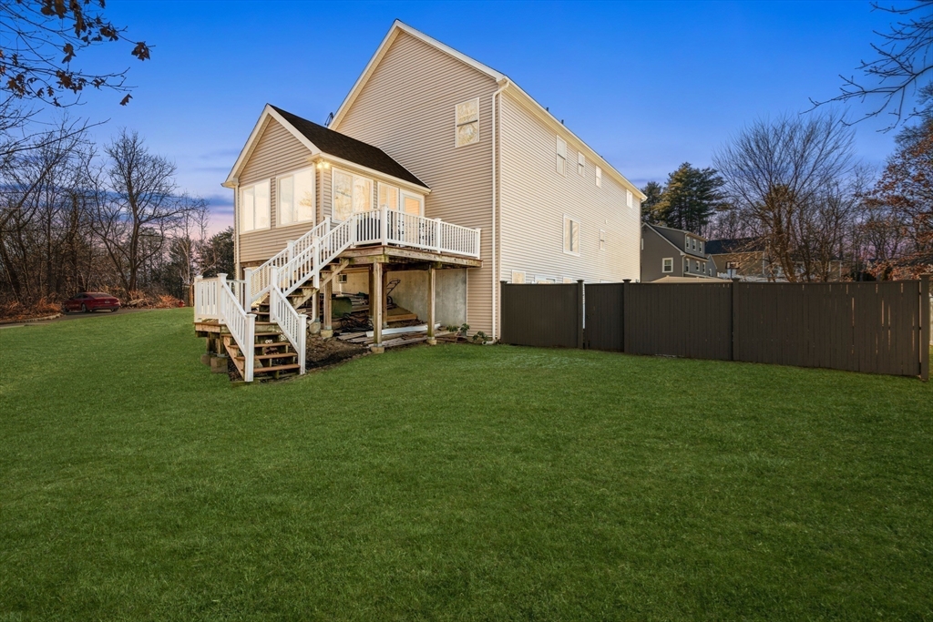 12 Silvermine Road Woburn, MA 01801 - Photo 35 of 36 a front view of a house with garden