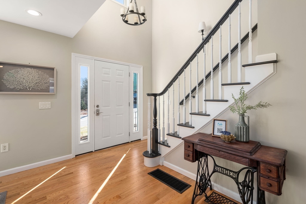 12 Silvermine Road Woburn, MA 01801 - Photo 5 of 36 a view of entryway and hall with wooden floor