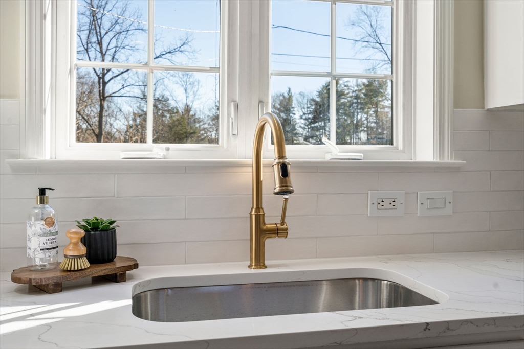 12 Silvermine Road Woburn, MA 01801 - Photo 8 of 36 a bathroom with a sink and a window