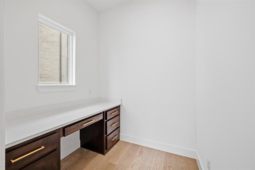 571 Twilight Drive Prosper, TX 75078 - Photo 17 of 30 a room with a window and wooden floor