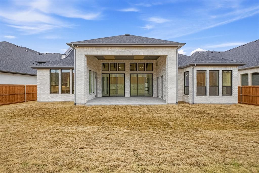 571 Twilight Drive Prosper, TX 75078 - Photo 30 of 30 front view of a brick house with a large window