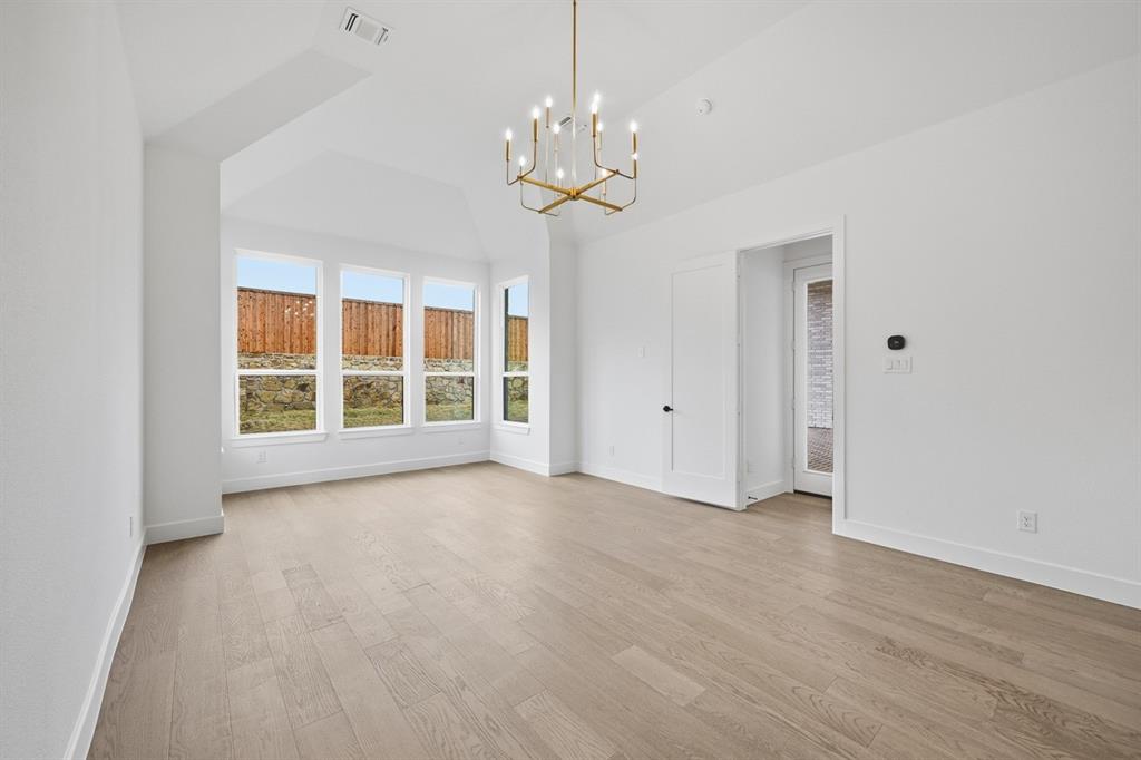 571 Twilight Drive Prosper, TX 75078 - Photo 10 of 30 a view of an empty room with a window