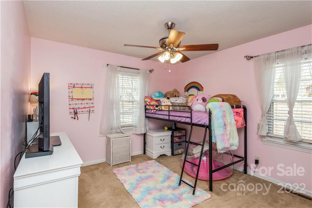 4600 Stallings Road Matthews, NC 28105 - Photo 24 of 38 a view of a workspace with furniture and a window
