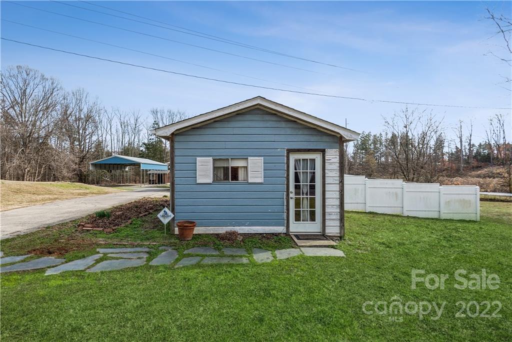 4600 Stallings Road Matthews, NC 28105 - Photo 29 of 38 a view of a house with a yard